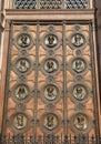 Budapest, B, Hungary - August 19, 2023: wooden door with faces at St Stephen s Basilica in Budapest Hungary