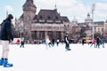 04.01.2022.Budapest.Family winter sport. Soft,Selective focus.Outdoor.Winter sport.Children and adults go ice skating on a winter