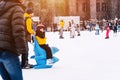 04.01.2022.Budapest.Happy little boy and girl learning to skate in winter.Hobbies and Leisure.Winter sports.Family