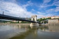 Wide landscape view the SzÃ©chenyi Chain Bridge, a chain bridge that spans the River Danube between Buda and Pest.