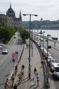 Budapest, Hungagry - september, 15, 2018 - Cyclists and pedestrians share the sidewalk and the bike path on a sunny day