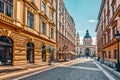 BUDAPEST,HUNGARU-MAY 04, 2016: St.Stephen Basilica in Budapest at daytime. View through street early morning. Hungary Royalty Free Stock Photo