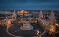 Budapest, Hungary - Aerial view of the famous Fisherman`s Bastion at dusk with Christmas festive lights Royalty Free Stock Photo