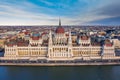 Budapest, Hungary - Aerial drone view of the beautiful Hungarian Parliament building with warm colors at sunset Royalty Free Stock Photo