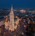 Budapest, Hungary - Aerial drone view of the beautiful illuminated Matthias Church at blue hour with Fisherman`s Bastion Royalty Free Stock Photo