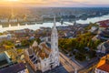 Budapest, Hungary - Aerial drone view of the beautiful Matthias Church at Castle district with a warm summer sunrise Royalty Free Stock Photo