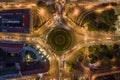 Budapest, Hungary - Aerial drone view of illuminated Clark Adam square roundabout from above at evening with traffic