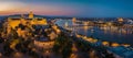 Budapest Hungary - Aerial panoramic skyline view of Budapest at blue hour with Buda Castle Royal Palace, Szechenyi Chain Bridge, P Royalty Free Stock Photo