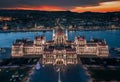Budapest, Hungary - Aerial panoramic view of the beautiful illuminated Hungarian Parliament building at dusk with Christmas tree Royalty Free Stock Photo