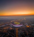 Budapest, Hungary - Aerial panoramic view of Budapest at dusk with a golden sunset. This view includes the Ferenc Puskas Stadium