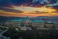 Budapest, Hungary - Aerial panoramic view of the famous Buda Castle Royal Palace at sunset with amazing colorful sky Royalty Free Stock Photo