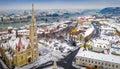 Budapest, Hungary - Aerial panoramic view of the snowy Buda district with Matthias Church, Buda Castle Royal Palace