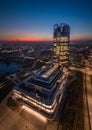 Budapest, Hungary - Aerial vertical panoramic view of Budapests new, illuminated skyscraper at Kopaszi-gat by the riverbank