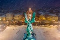 Budapest, Hungary - Aerial view of angel sculpture at Heroes ` Square Hosok tere with Christmas decorated Andrassy street Royalty Free Stock Photo