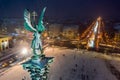 Budapest, Hungary - Aerial view of angel sculpture at Heroes` Square Hosok tere with Christmas decorated Andrassy street Royalty Free Stock Photo