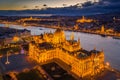 Budapest, Hungary - Aerial view of the beautiful illuminated Parliament of Hungary at dusk with Szechenyi Chain Bridge Royalty Free Stock Photo