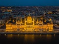 Budapest, Hungary - Aerial view of the beautiful illuminated Parliament of Hungary Orszaghaz at blue hour Royalty Free Stock Photo