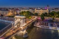 Budapest, Hungary - Aerial view of the beautiful illuminated Szechenyi Chain Bridge with St. Stephen`s Basilica Royalty Free Stock Photo