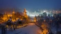 Budapest, Hungary - Aerial view of the beautiful snowy Vajdahunyad Castle at blue hour with Christmas market