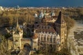 Budapest, Hungary - Aerial view of beautiful Vajdahunyad Castle in City Park at sunset with dark clouds