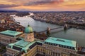 Budapest, Hungary - Aerial view of Buda Castle Royal Palace with Szechenyi Chain Bridge, Parliament and colorful clouds Royalty Free Stock Photo