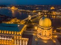 Budapest, Hungary - Aerial view of the dome of Buda Castle Royal Palace at dusk and the skyline of Budapest Royalty Free Stock Photo