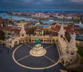 Budapest, Hungary - Aerial view of the famous Fisherman`s Bastion at dusk with statue of King Stephen I and Parliament Royalty Free Stock Photo