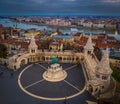 Budapest, Hungary - Aerial view of the famous Fisherman`s Bastion at dusk with statue of King Stephen I and Parliament of Hungary Royalty Free Stock Photo