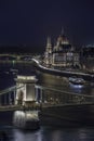 Budapest, Hungary - Aerial view of the famous illuminated Szechenyi Chain Bridge and Hungarian Parliament Royalty Free Stock Photo