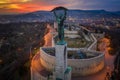 Budapest, Hungary - Aerial view of the Hungarian Statue of Liberty with Buda Hills and amazing colorful sunset Royalty Free Stock Photo