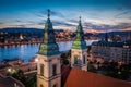 Budapest, Hungary - Aerial view of illuminated Budapest Inner-City Mother Church of Our Lady of the Assumption at dusk