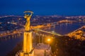 Budapest, Hungary - Aerial view of Budapest with illuminated Statue of Liberty, Liberty Bridge and sightseeing boats