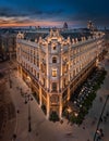 Budapest, Hungary - Aerial view of a renovated illuminated luxury collection hotel near Ferenciek tere after sunset