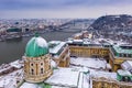 Budapest, Hungary - Aerial view of the snowy Buda Castle Royal Palace with Statue of Liberty, Elisabeth and Liberty Bridge