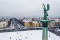 Budapest, Hungary - Aerial view of the snowy Heroes` Square with angel sculpture and Andrassy street Royalty Free Stock Photo