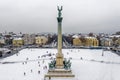 Budapest, Hungary - Aerial view of snowy Heroes` Square Hosok tere with Andrassy and Dozsa Gyorgy street