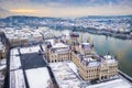 Budapest, Hungary - Aerial view of the snowy Parliament of Hungary with Szechenyi Chain Bridge, Buda Castle Royal Palace Royalty Free Stock Photo