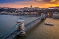 Budapest, Hungary - Aerial view of Szechanyi Chain Bridge and Buda Castle Royal Palace with a beautiful golden sunset Royalty Free Stock Photo