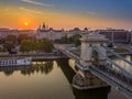 Budapest, Hungary - Aerial view of the Szechenyi Chain Bridge at sunrise with St. Stephen`s Basilica Royalty Free Stock Photo