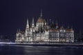 Budapest, Hungary - The amazing illuminated Hungarian Parliament building by the River Danube Royalty Free Stock Photo