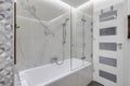 Budapest, Hungary - April 18, 2019: Luxury white marble bathroom in an Airbnb accommodation, angled view Royalty Free Stock Photo