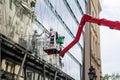 Workman washing the building`s window glass Royalty Free Stock Photo