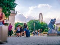 View on the people walking on the Deak Ferenc square with the Budapest Eye wheel is in the background Royalty Free Stock Photo