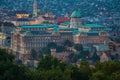 Budapest, Hungary - The beautiful Buda Castle Royal Palace with the Buda hills and the Matthias Church Royalty Free Stock Photo