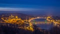 Budapest, Hungary - The beautiful illuminated Historic Royal Palace or Buda Castle with Szechenyi Chain Bridge Royalty Free Stock Photo