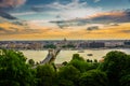 Budapest, Hungary: Beautiful landscape of the city, the bridge and the Danube river at sunset. Panorama top view from the hill to Royalty Free Stock Photo