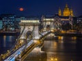 Budapest, Hungary - Blood Moon rising over downtown of Budapest with beautiful Szechenyi Chain Bridge and St. Stephen`s Basilica Royalty Free Stock Photo