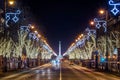 Budapest, Hungary - Christmas lights on Andrassy street with Heroes` Square at background Royalty Free Stock Photo