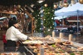 Budapest, Hungary - December 28, 2018: Food stand with traditional Hungarian food at Christmas fair on Vorosmarty square