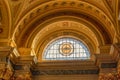 Budapest, Hungary - Feb 8, 2020: Ceiling view with coronation symbol window in Stephen`s Basilica